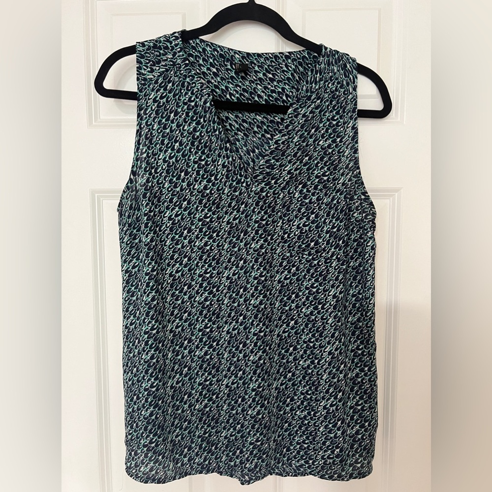 Maurices sleeveless blouse in blue and aqua scale pattern. Like new!